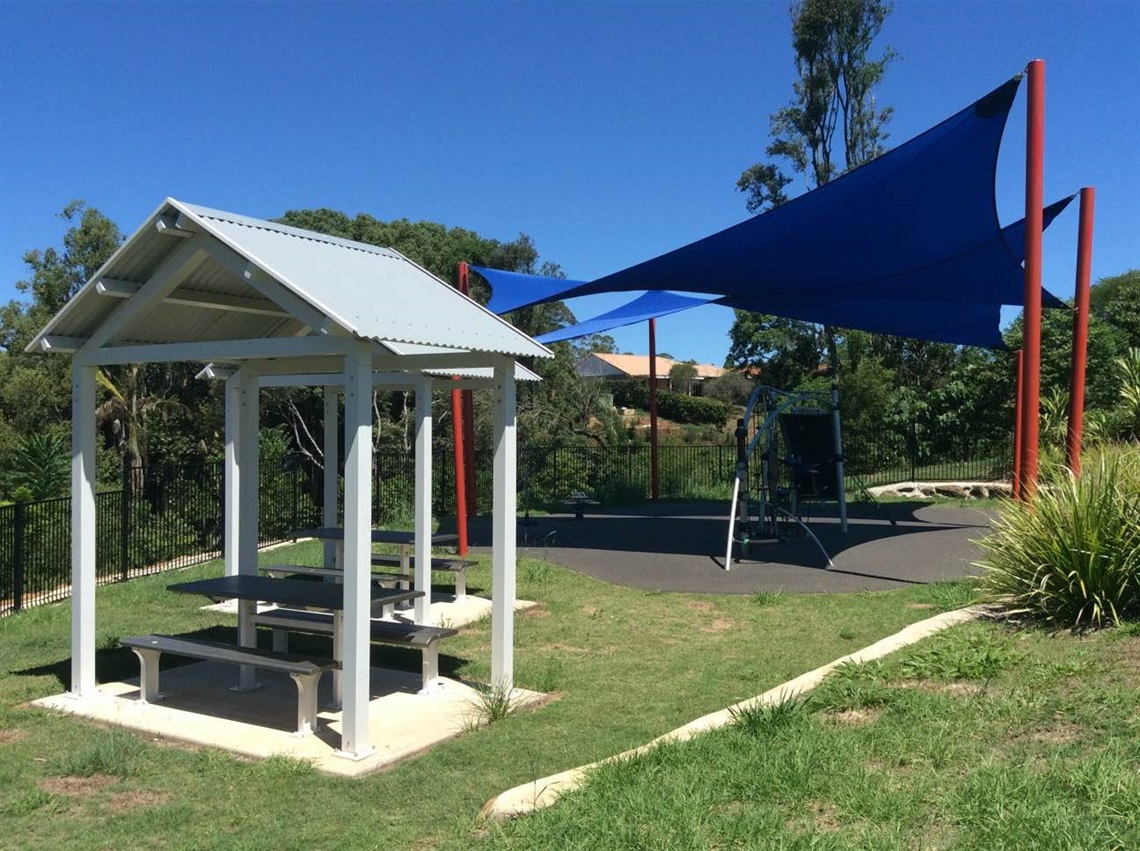 picnic tables and shaded play equipment